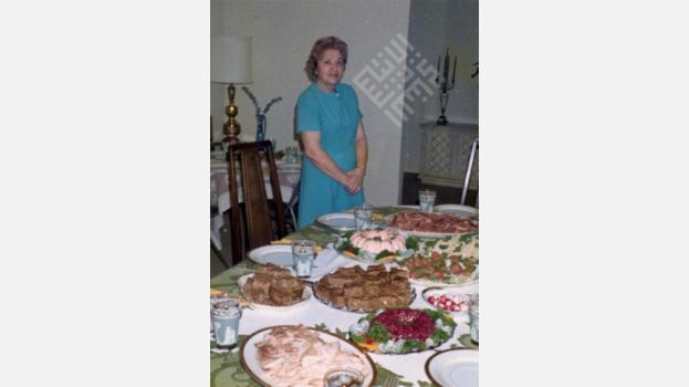 Nell Heeden Mansour at a Dinner Table