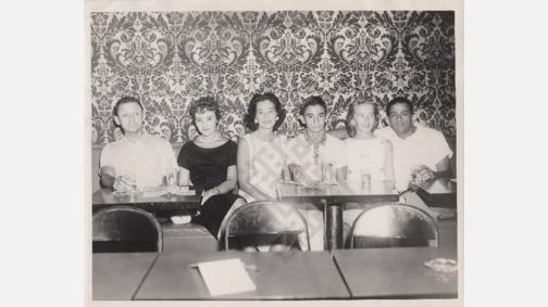 Members of the Moses Family at a Restaurant, circa 1950s